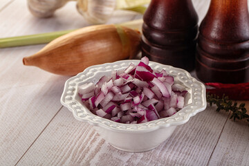 Diced red onion in the bowl