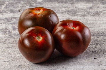 Raw juicy sweet tomato Kumato