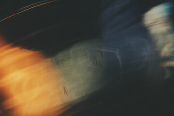 Abstract fiery explosion with dark smoky background and subtle light streaks