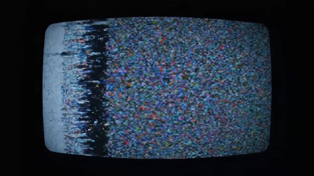 Television Static on CRT Screen - A close-up of a CRT television displaying static noise and color distortion.