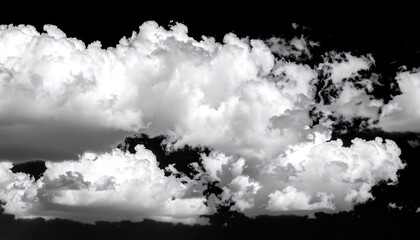 A grayscale photograph portrays puffy, voluminous clouds against a stark black backdrop, accentuating their billowy forms and soft textures