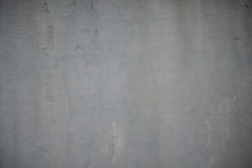 Subtle textured gray background with a slightly distressed and weathered appearance