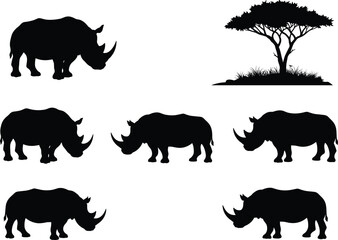 Rhinoceros silhouette vector set, African wildlife illustration, tree and grass elements, black animal shapes, nature scene design for stock content