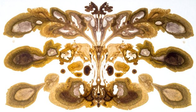 Symmetrical inkblot pattern, earthy tones, abstract forms