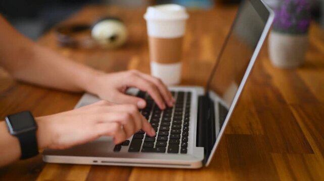 Dolly Shot of Businesswoman Typing and Using Laptop Computer, Hands Working on Digital Device, 4K Ultra HD Stock Video