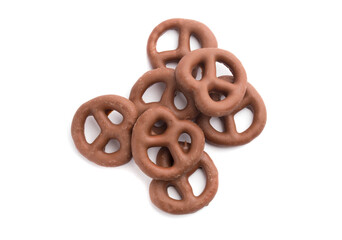 Chocolate pretzels top view on a white background