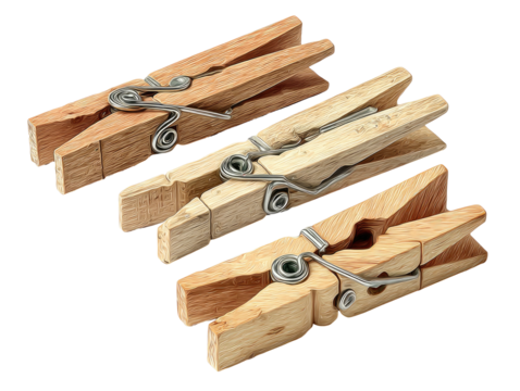 Three wooden clothespins with metal springs against black
