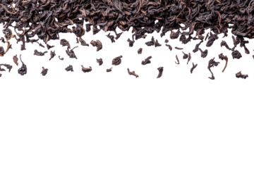 Dry, dark tea leaves scattered across the top, fading to black
