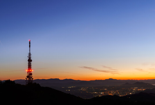 Communications tower. Antennas at sunset on Mount Jaizkibel, Basque Country