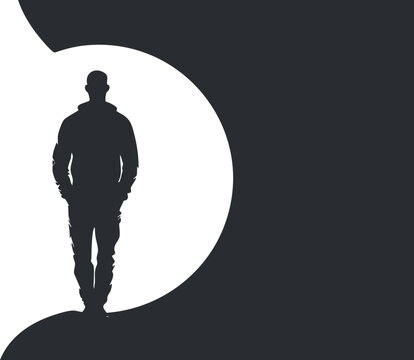 Silhouette of a man walking against a contrasting black and white background, creating a mysterious ambiance.