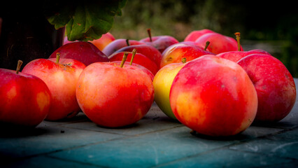 red apples on wooden background