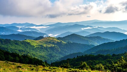 Fototapeta premium A panoramic vista unveils rolling mountains, draped in layers of varying green hues, under a cloudy sky, creating depth and tranquility
