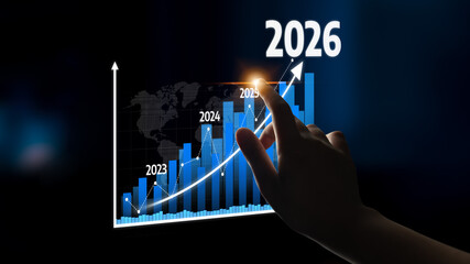 A hand interacts with a digital graph showing growth from 2023 to 2026, emphasizing future...