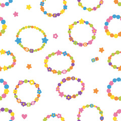 Kids jewelry featuring a seamless pattern, plastic beads embellishing handmade 90s‑style pieces, including friendship bracelets and letter beads