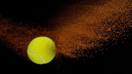 Freeze Motion Shot of Flying Tennis Ball with Clay , Isolated on Black Background