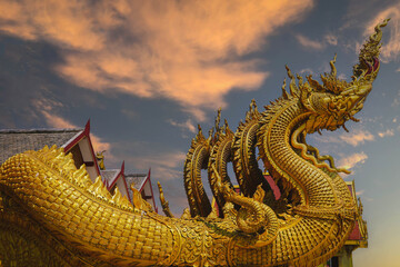 Fototapeta premium Golden king of naga thai temple Lanna style In Thailand