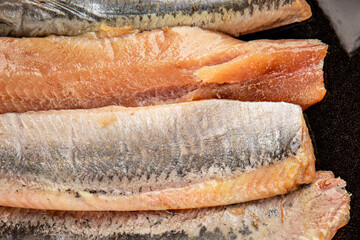Herring fillet fish fresh seafood portion size natural product tasty snack fresh delicious gourmet food background on the table rustic top view copy space pescetarian diet