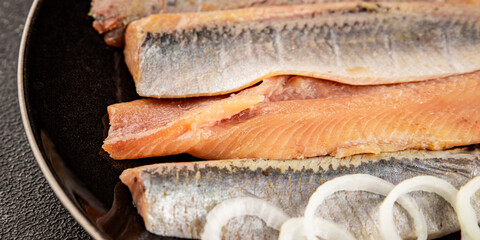 Herring fillet fish fresh seafood portion size natural product tasty snack fresh delicious gourmet food background on the table rustic top view copy space pescetarian diet