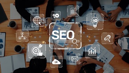 A diverse group collaborates on SEO strategies, using charts and icons to discuss data analysis in a modern workspace, emphasizing teamwork and digital marketing. Raster