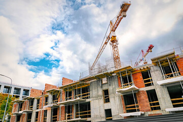 New house construction. Concrete frame and crane