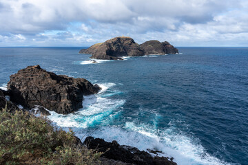 Fototapeta premium View of Ilheu De Ferro from Furado Norte Viewpoint in Porto Santo, Madeira, Portugal