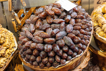 Dried dates on display in farmers market in Madeira, Portugal