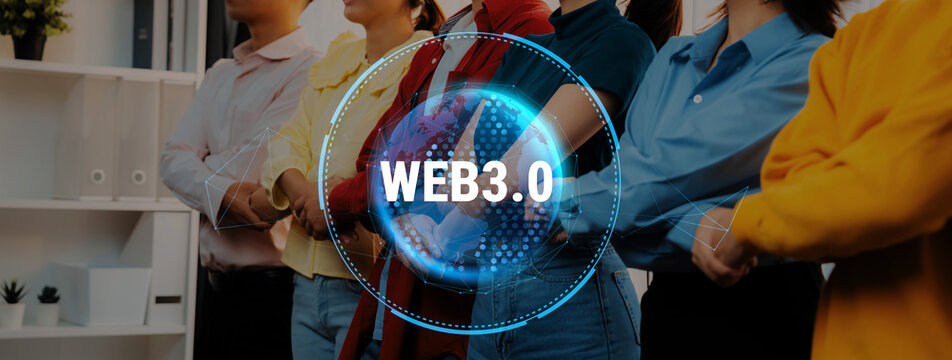 A diverse group of young professionals stand united behind a visual representation of Web3.0, symbolizing future collaboration and innovation in a modern office setting. Trope