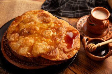 Mexican Buñuelos. Traditionally fried wheat tortillas used for Christmas and winter holidays, these are fried flour tortillas sprinkled with sugar or covered in a syrup made with piloncillo, cinnamon,