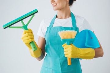Woman in Cleaning Uniform Holding Tools – Concept of Housekeeping, Hygiene, and Domestic Work