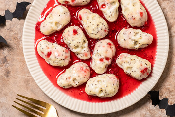 lazy dumplings vareniki with raspberry sauce for Halloween