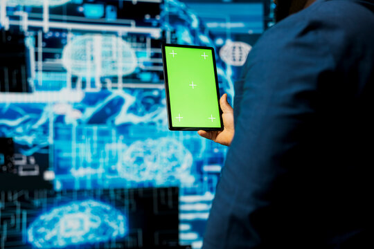 African american person holds tablet with mockup display with cloud computing, focused on AI brain development and deep learning for innovation. Smart technology data science concept. - Powered by Adobe