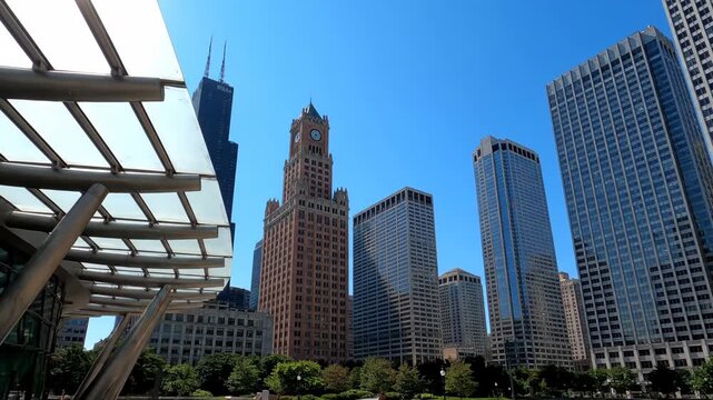 Modern architecture with a clock tower in the background under a clear blue sky, showcasing urban cityscape and contemporary design vector illustration