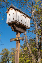 Close-up of a Birdhouse Modelled After a Mill
