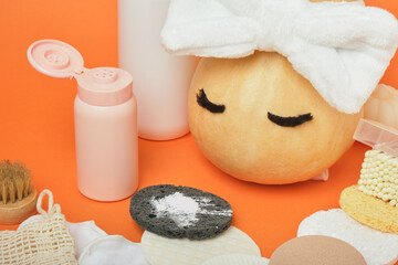 Enzyme powder for autumn skin care, pumpkin and various sponges for removing makeup and washing on...