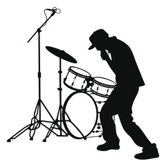 Drummer leaning on drum silhouette