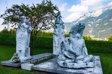 Statues in the cemetery of the Vajont victims in Longarone, Italy