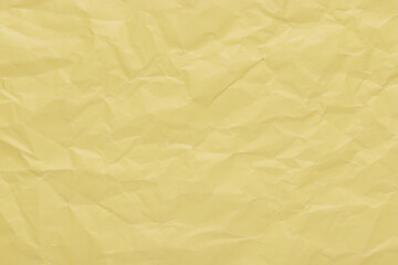 Butter yellow color crumpled paper texture, blank template wrinkly background with copy space