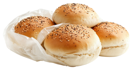 Sesame topped, round burger buns nestled in a clear, plastic bag