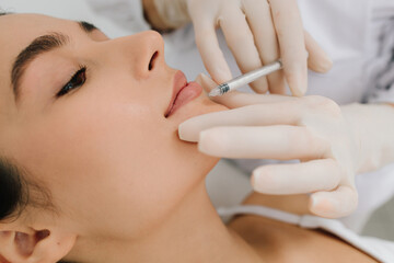 Lips rejuvenation with botulinum toxin for sculpt and lift lips, restoring natural volume and...