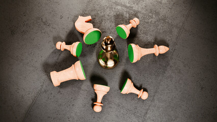 Wooden chess pieces lying around golden piece on concrete floor