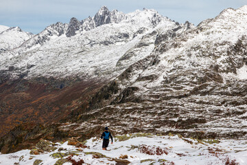 A trail runner in the snow in French Alps, Aiguilette de Houches, Les Houches, France