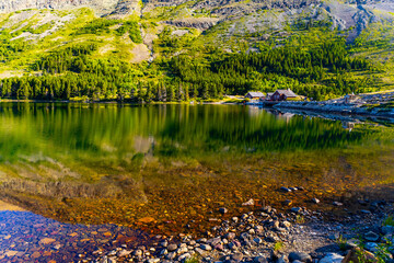 Beautiful sunrise at Swiftcurrent Lake in Glacier National Park