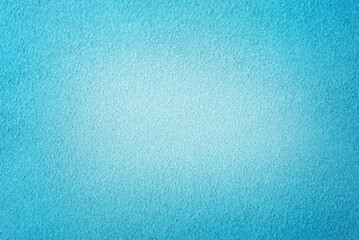 Background of blue suede leather. Blue suede vignette.