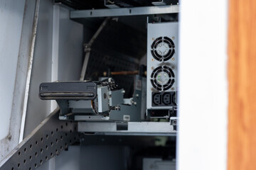 Mid-Range Shot of an Opened ATM Interior
