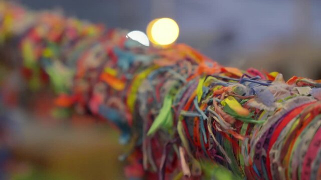 Colored ribbons in Salvador, Bahia, Brazil. A famous tourist spot where people make wishes while tying ribbons at the Bon Fim church.