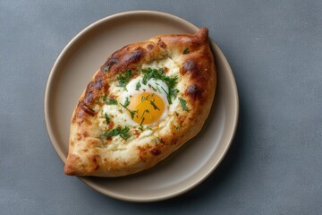 Delicious Khachapuri Topped With Egg and Herbs Served on a Plate