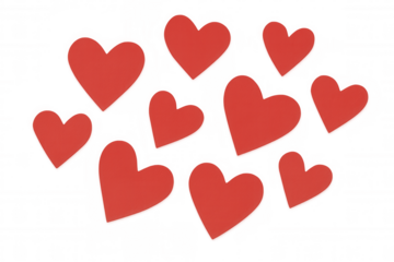 Red paper hearts scattering on transparent background illustrating love, romance, and valentine's day