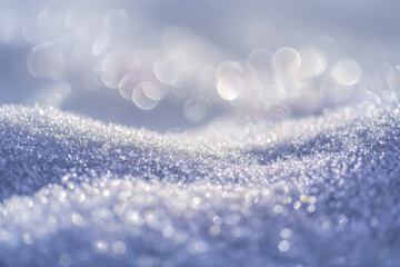 Sparkling natural frost or snow surface illuminated by soft sunlight creating a dreamy and shimmering winter landscape with blurred bokeh background effects