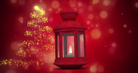Image of snow falling over christmas decoration with lantern