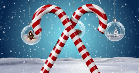 Image of snow falling over christmas decoration with baubles